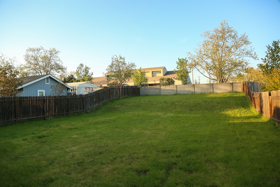 Backyard with a finished wood fence