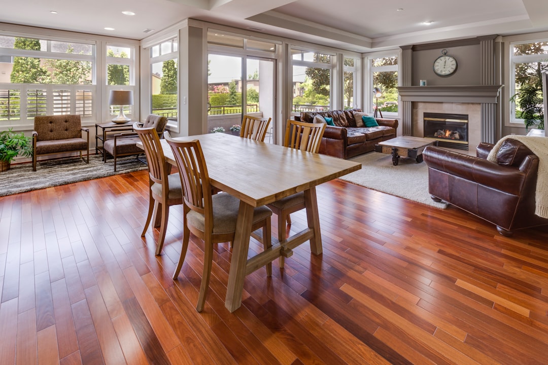 Finished interior room with hardwood flooring