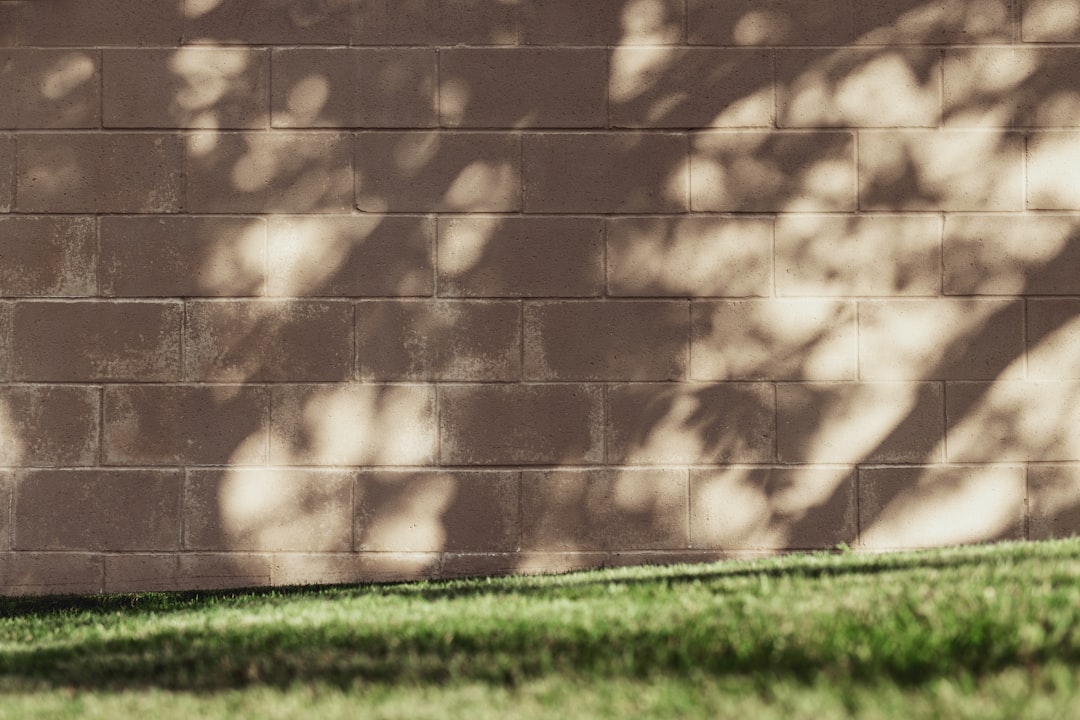 Landscaped retaining wall built from stacked blocks