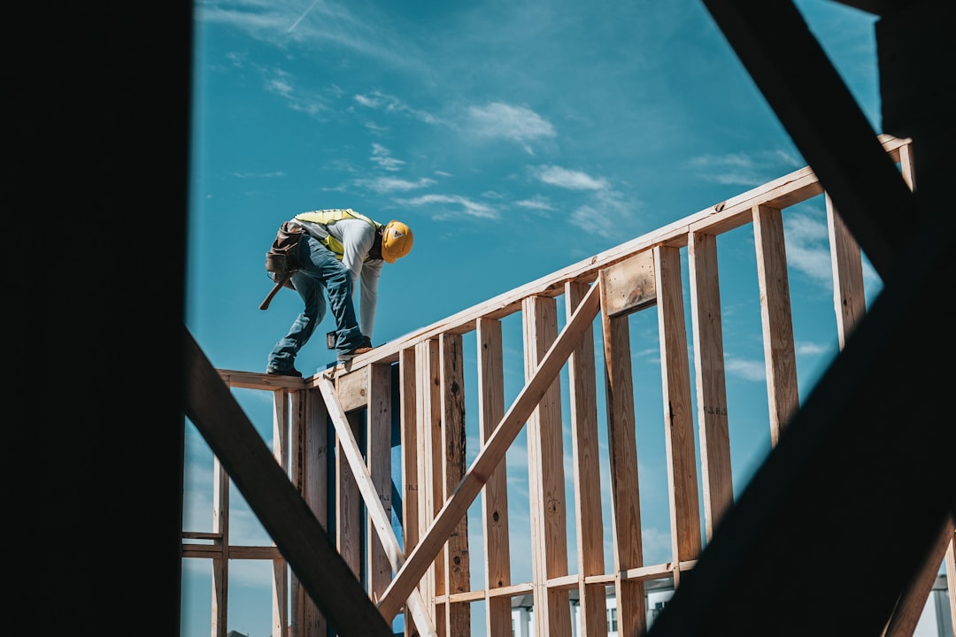 Wood framing studs in a wall under construction