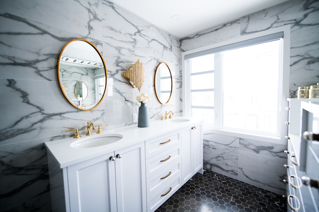 Bathroom with marble tile surfaces